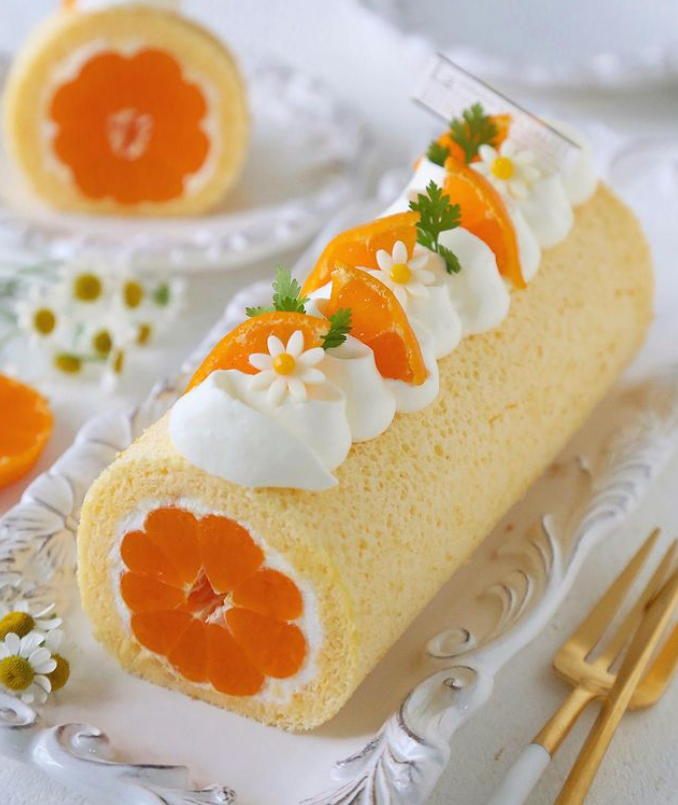 Tangerine roll made by atelieranne_cakes