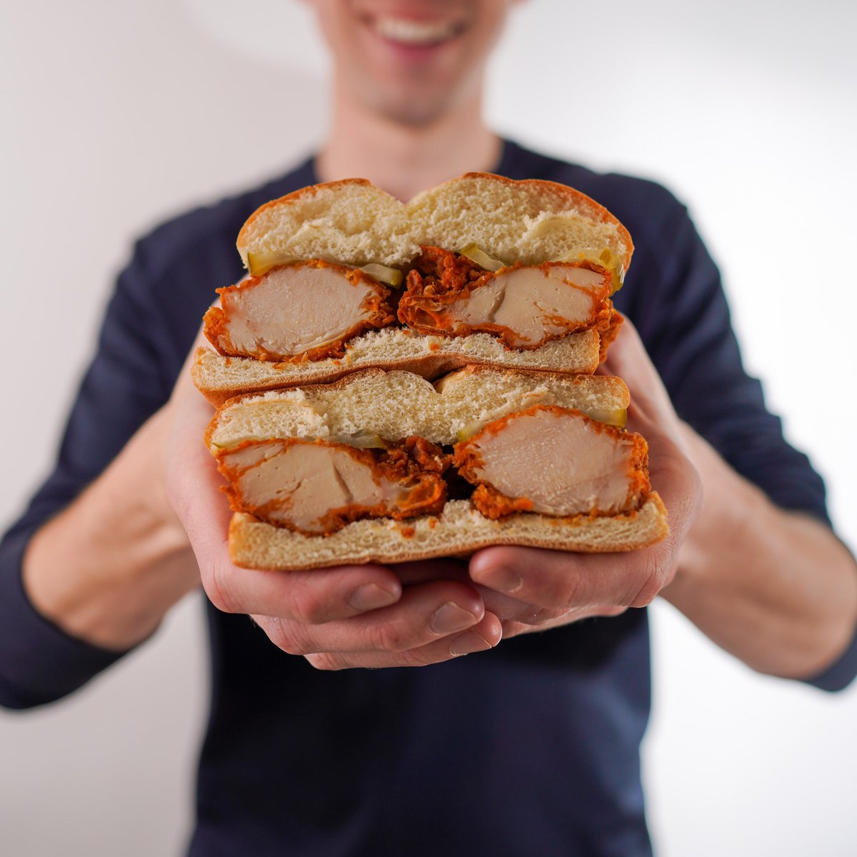 WingZone's tweet image. Double the tenders, double the flavor! 

Have you tried our chicken sandwich that features TWO tenders, tossed in one of 18 flavors and served on a bun with pickles. 

Order now: wingzone.info/WZOrder