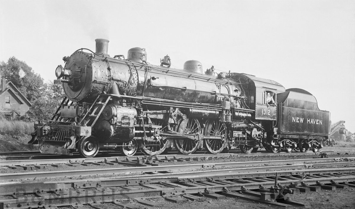 MBTA_CR's tweet photo. 🚂 Another #TBT with a New Haven locomotive 1312, an I-2 class "Pacific" type locomotive ready to go back in service to haul commuter trains. 

📆 August, 1937

📍 Readville, MA

📸 Taken by Robert E. Chaffin &amp; provided by B&amp;MRRHS Collection: https://t.co/ioiJwtsLlX https://t.co/avpRNPlmzh