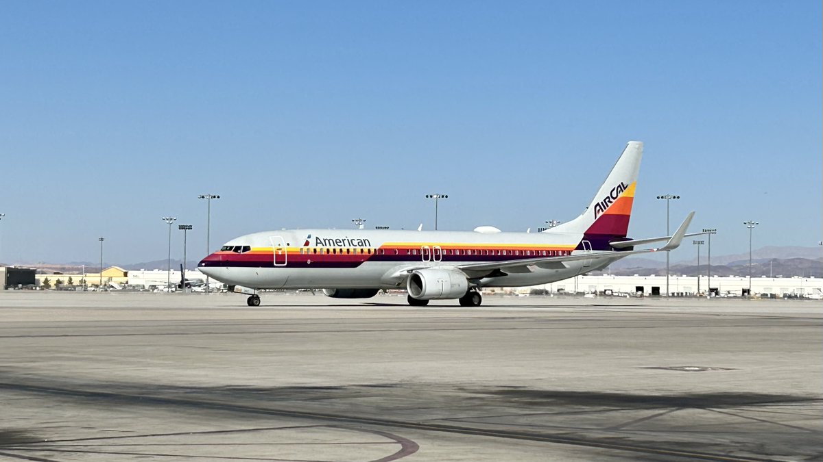 LASairport's tweet photo. #SPOTTEDATLAS! What better way to celebrate #TBT than with this American Airlines retro livery? This beauty is painted in AirCalโs original colors in an ode to the Newport Beach-based airliner that later merged with American Airlines. โ๏ธ #avgeek https://t.co/fwBpOJOdGJ