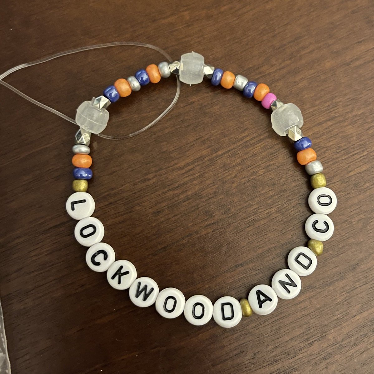 I did end up making a Lockwood and Co bracelet 😄 I didn’t have black beads, so I did silver, orange, and blue for the Iron Trio (with one little pink bead for Lockwood’s pink socks🩷)👻⚔️🖤
#SaveLockwoodandCo #LockNationCraftersDay