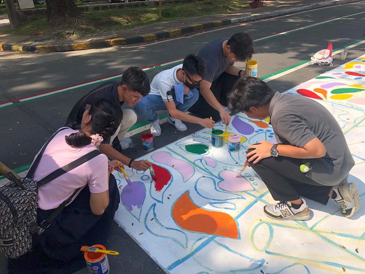 upbabaylan's tweet photo. LOOK: People are joining the #PaintTheRainbow community painting initiative near the Rainbow Crosswalk, along Palma Hall! π¨π
Together, letβs bring π love & color π to UP!
Happy #Pride! π³οΈβππ³οΈββ§οΈ
#UPForEquality
#SOGIEEqualityNow
#Pride2023 https://t.co/HEu3yOQsvL