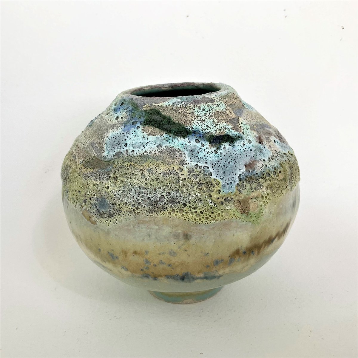 Coastal Orb by Marie Pearson. I can hear the tide coming in and see the salty foam on the rocks. #tonbridgehighstreet #summer #ceramicart #seaart #inspiredbynature #water #contemporaryceramics #seascape #beach #tides