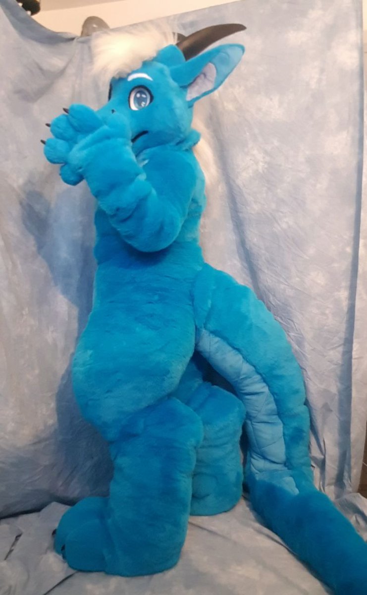 Hiding seams is INCREDIBLY difficult. The one suit I've done that has no visible seams took me SO long to do.

Trimming the edge seams, sewing precisely, picking the fur out. 

But it does not make me any less of a maker for having other suits with visible seams.