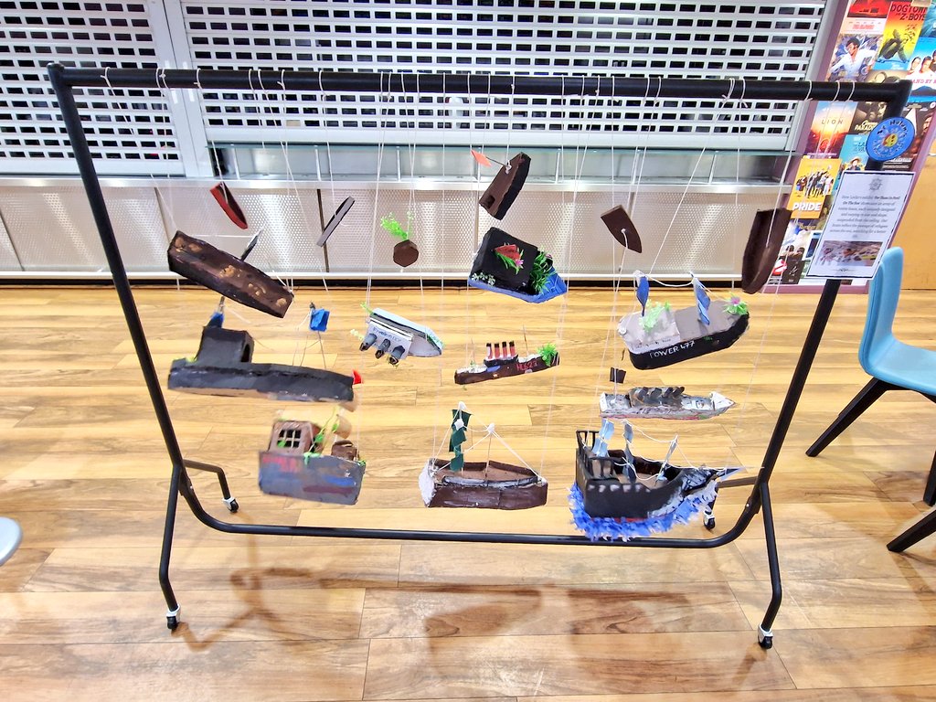 sthelensp's tweet photo. Coinciding with #RefugeeWeek our art exhibit for #PrimaryDanceProject @TaliesinSwansea features work inspired by #HewLocke - here is our fleet of hand made votive boats reflecting the harrowing journey of those crossing the sea for a better life! ⛵️ #sthpexart @The_Lowry @Tate https://t.co/7VKvcEjux2