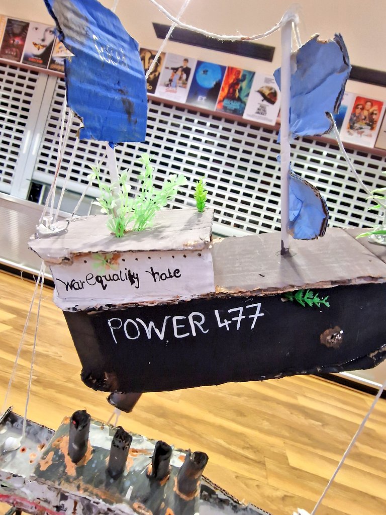sthelensp's tweet photo. Coinciding with #RefugeeWeek our art exhibit for #PrimaryDanceProject @TaliesinSwansea features work inspired by #HewLocke - here is our fleet of hand made votive boats reflecting the harrowing journey of those crossing the sea for a better life! ⛵️ #sthpexart @The_Lowry @Tate https://t.co/7VKvcEjux2