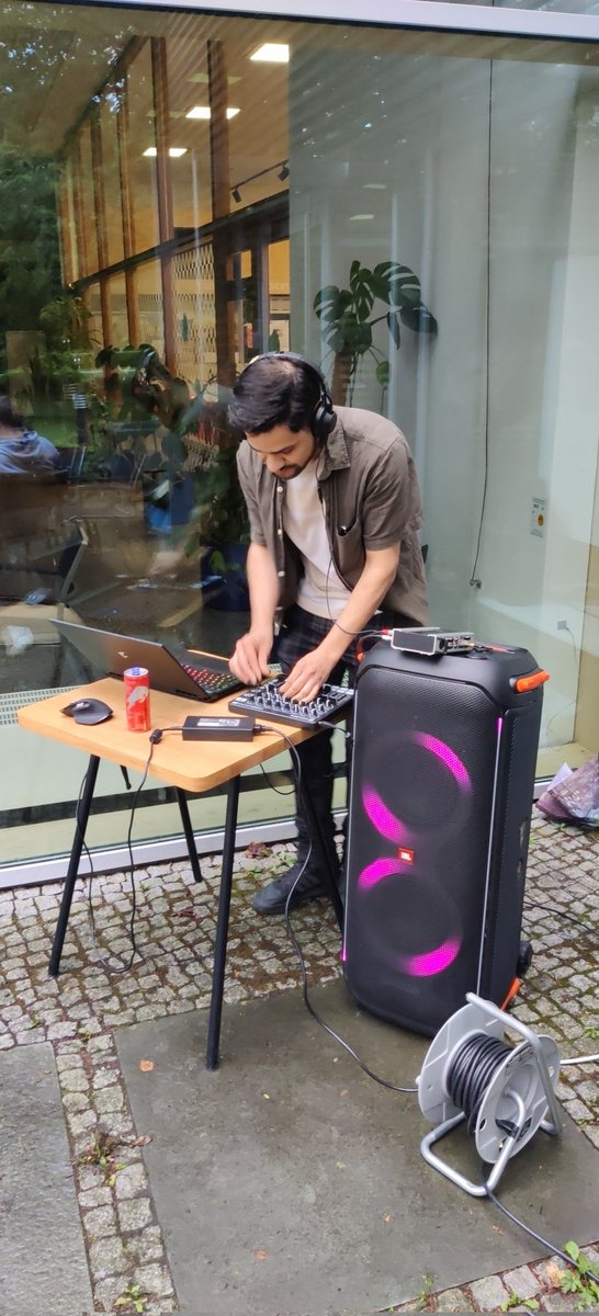 DJ Ernesto keeping the jams going in our Mensa Beer Hour