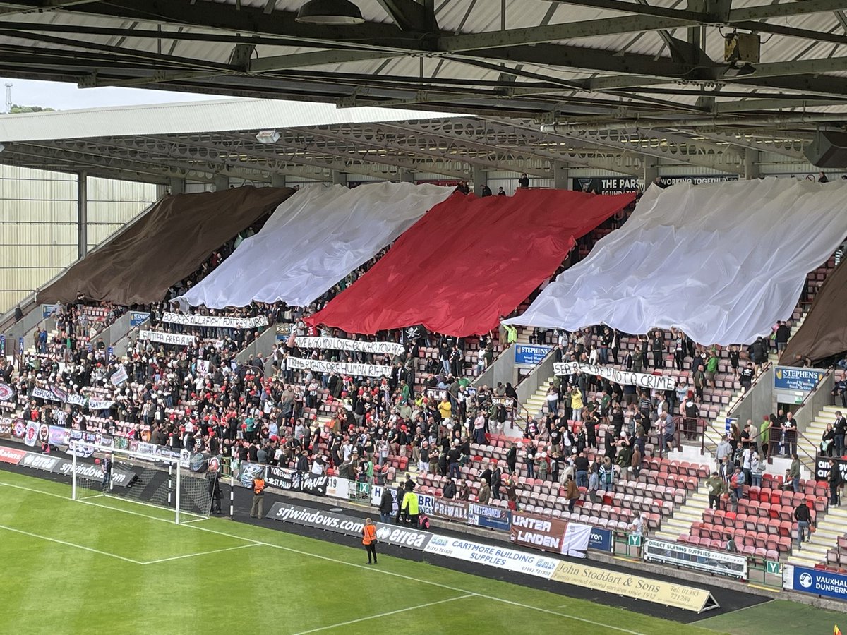 fcstpauli_EN's tweet photo. Some of the banners in the away section: Sea rescue is not a crime. Trans rights are human rights. Refugees welcome. 

#fcsp #dafcfcsp #fcspGoesUK #FootballHasNoGender https://t.co/A3lsrxF4oc