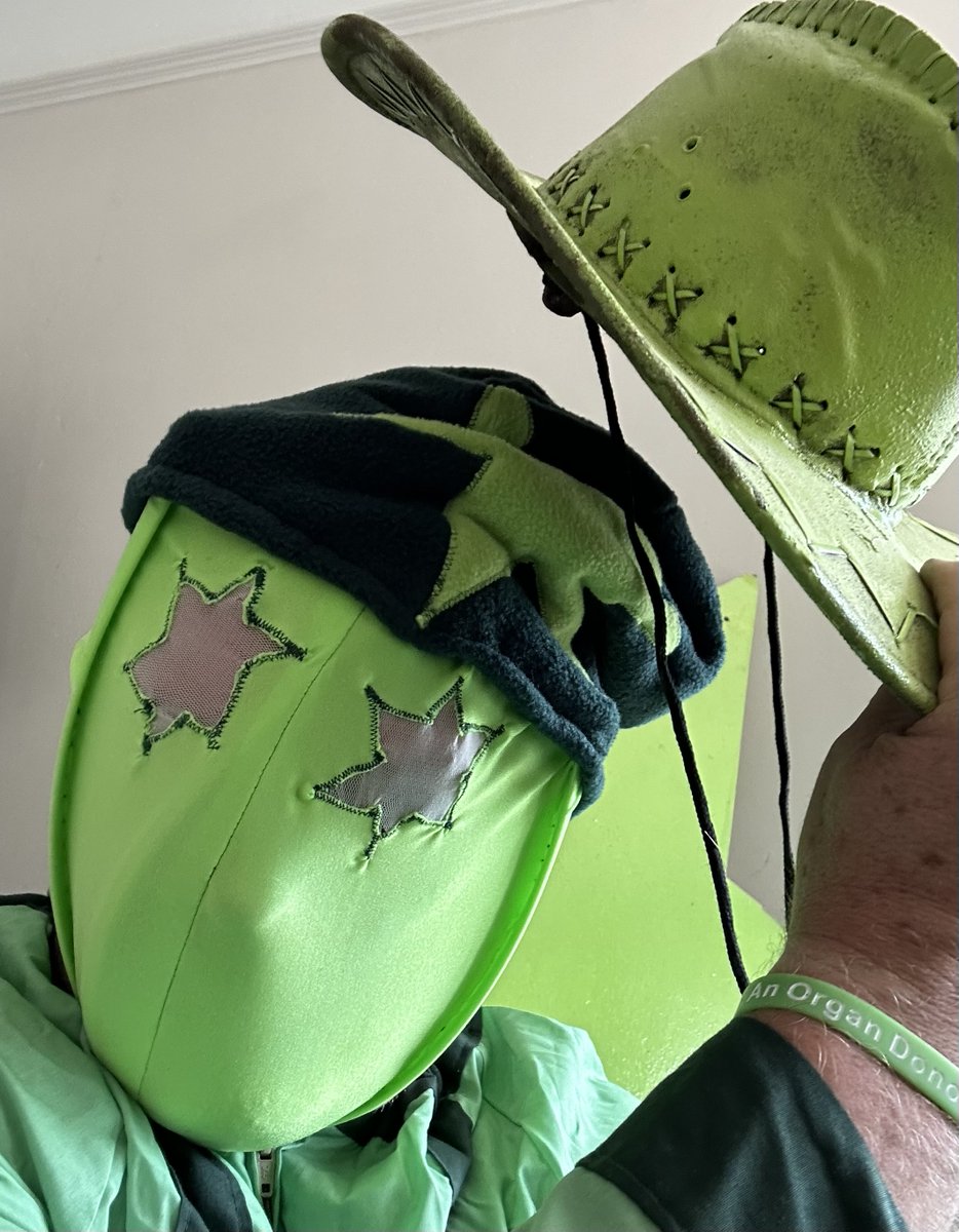 A picture of him 'doffing his hat' to someone. A message telling (Not Asking) us to cancel everything on Monday, "it's going to be busy". Not helpful in the least. We don't even know what to wear. he's OK. Only has one suit.