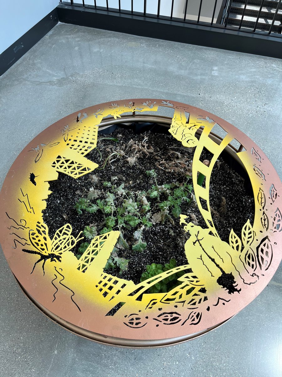 GrohmannMuseum's tweet photo. Walk through #TheAvenueMKE to view "Dear Nature," a Sculpture MKE exhibition featuring art designed by local college students. 
@MSOE students designed “Recipro(city),” which blends an artistic depiction of #Milwaukee with a self-watering system &amp; garden. https://t.co/W8nVcTvRkQ