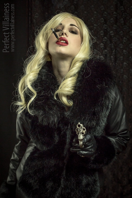 Wicked blonde doll · Villainess 2018 · #noir #filmnoir #leather #gloved #fur #villainess #gun #gungirl #smoking #sobranie #smokingfetish