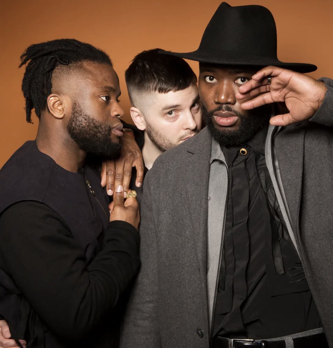 young fathers is fr the best band of the past decade easily but in every photoshoot they pose like the world’s shyest most solemn weary gay throuple ever