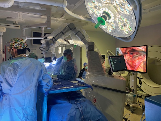 SynaptiveMed's tweet photo. Congratulations to Dr. Williamson and @AHNtoday on performing their first case with our redesigned 4K 3D #RoboticExoscope, #ModusX. He notes "the new 4K 3D optics provided unparalleled visualization to expose the ganglion nerve root and perform a safes resection". https://t.co/k1KH5UY1wz