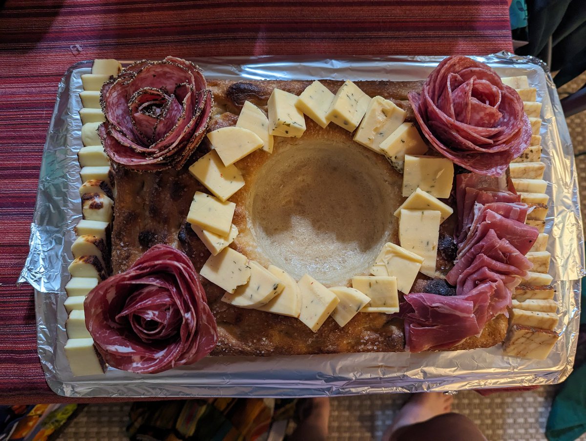 I made a charcuterie board out of focaccia (just picture hummus in the center)