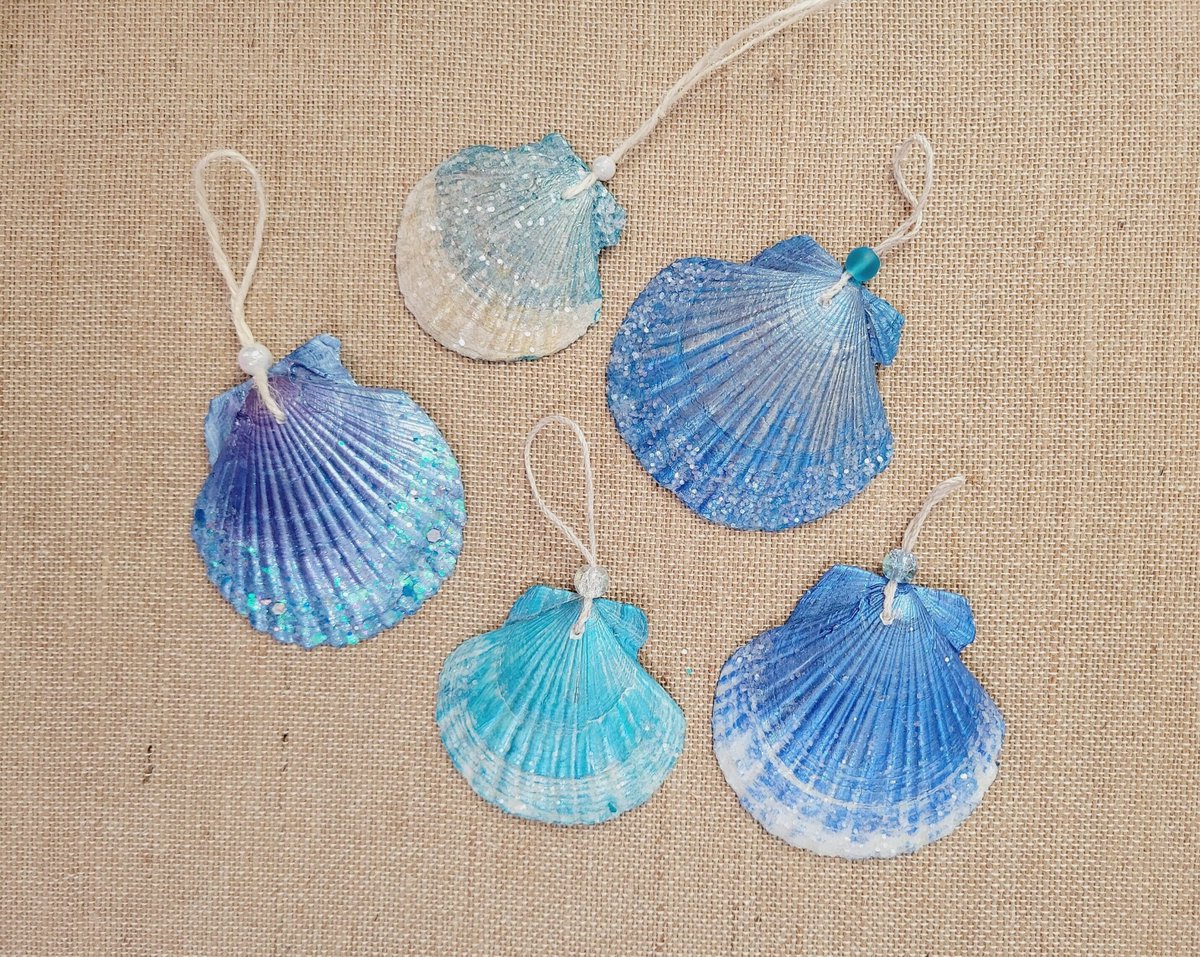 Glitter Seashell Ornaments in Shades of Blue 

2TreeDesigns.com

#christmas #upcycled #christmasornaments #holidayornaments #presenttopper #seashell ornaments #beachdecor
