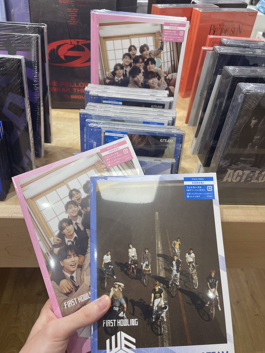 Picked up @andTEAMofficial albums I wrote on the other day! I keep posting about this but it’s such a surreal experience going into a kpop store seeing something you worked on displayed 😭😭 please go buy hehe 🖤 #andTEAM #FirstHowling_WE