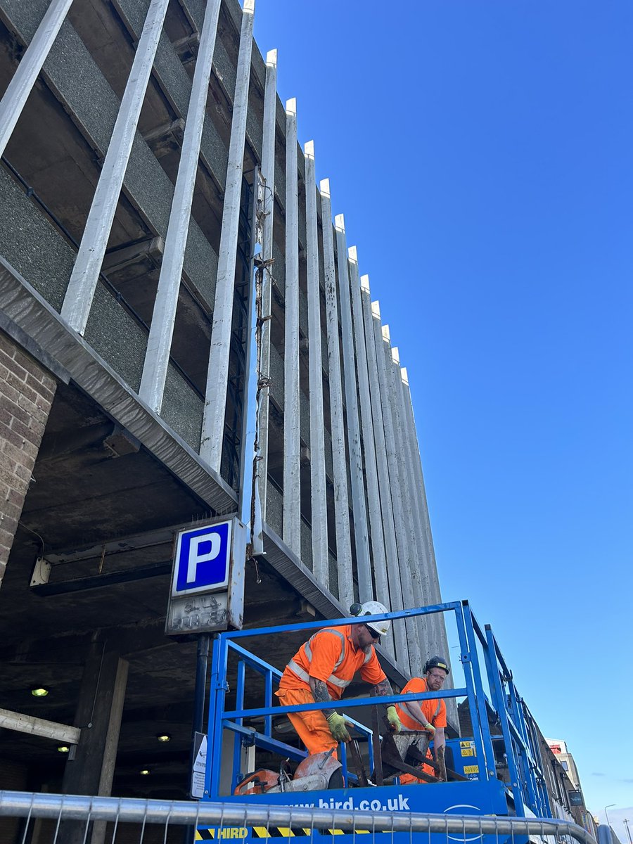 A fine morning to be taking down the main sign to the George Street multi-storey car park in the centre of Hull. The sign is defective. Smart work by the site team. #demolition