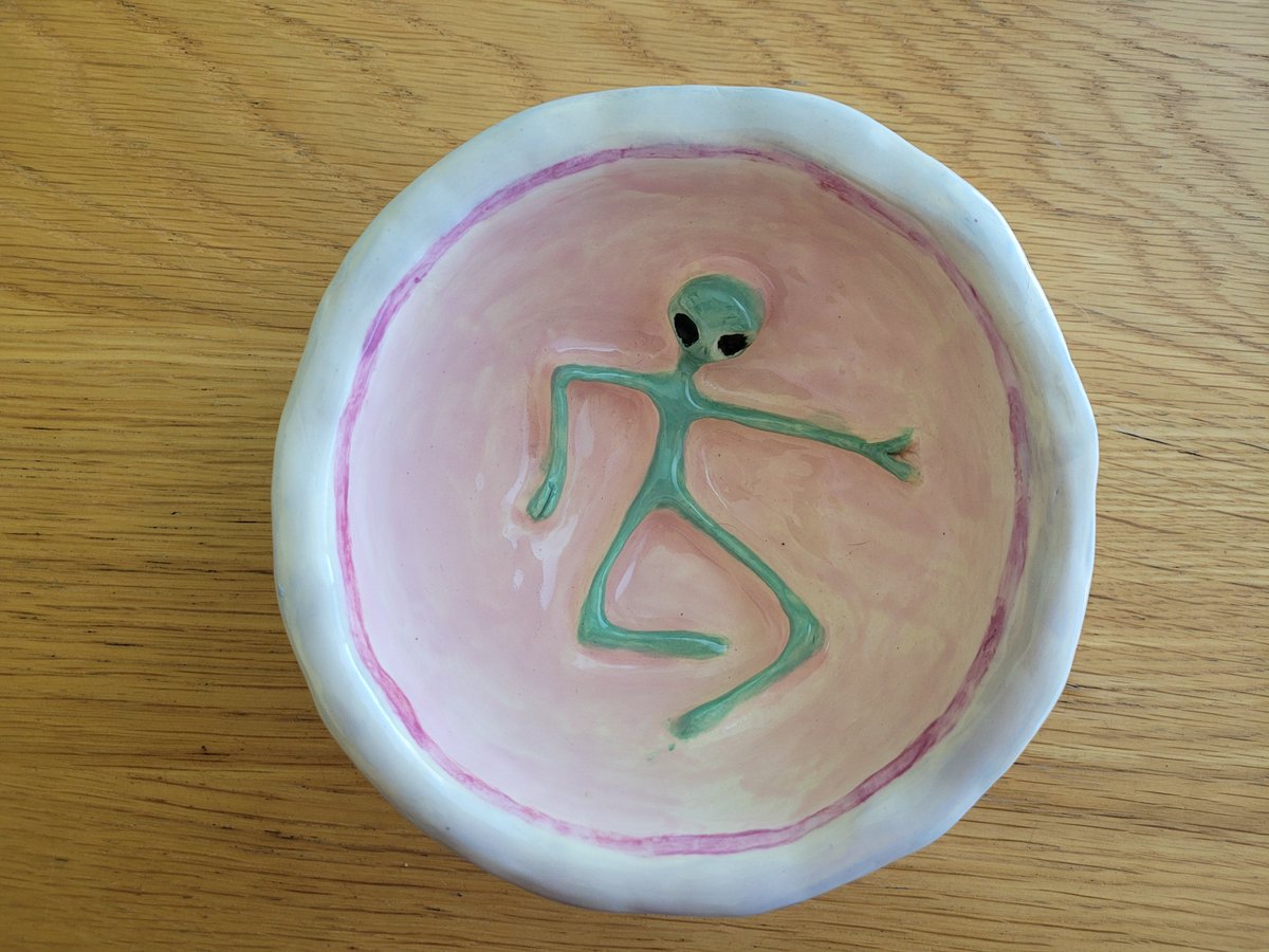 #CreativeKids surprise us.

A tweet just reminded me of an alien bowl my kid made at school back a few years ago.
I love it!