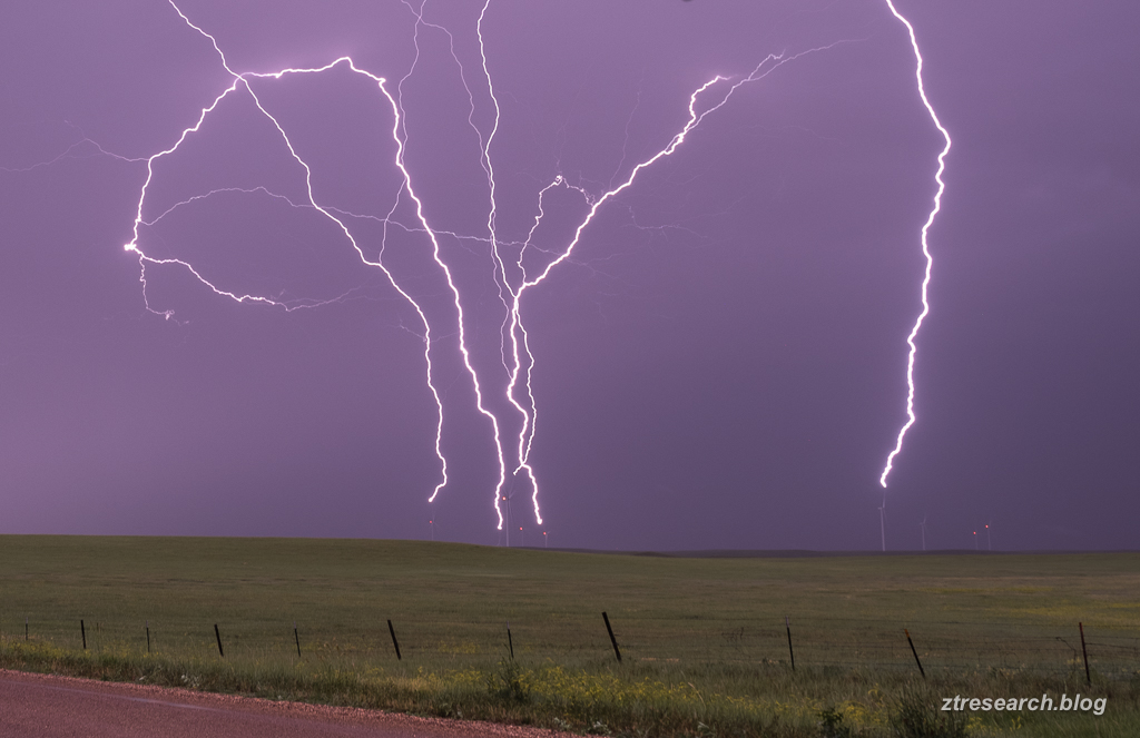 I count five wind turbines with upward #lightning leaders.  Captured this and three other upward flashes this evening at Willow Creek Windfarm northeast of Newell, SD. #sdwx