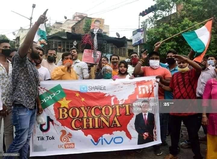 The slogan is on a fabric made in China and printed using a made-in-China printer. The photograph was taken using a camera made in China. Even Indian flags are made in China. Indian hypocrisy knows no limits.