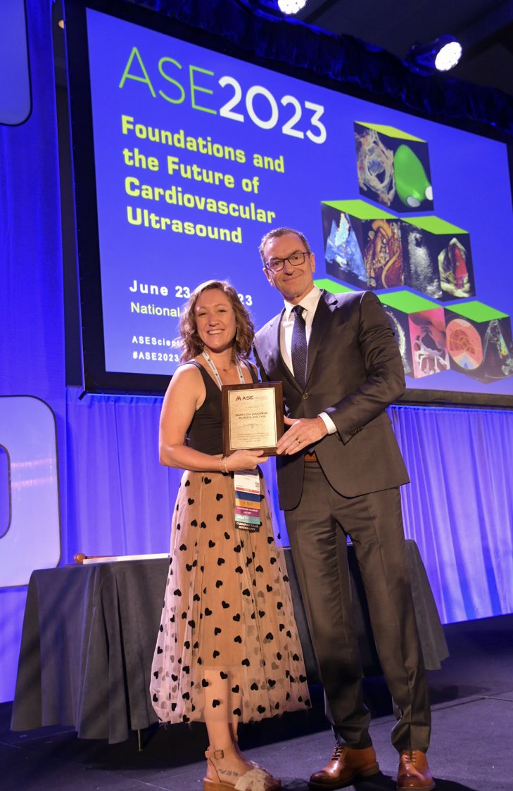 ASE President @SLittleMD presents an award to the Chair and Co-Chair of #ASE2023, James N. Kirkpatrick, MD and @maddiejane25, BS, ACS, RDCS, FASE!