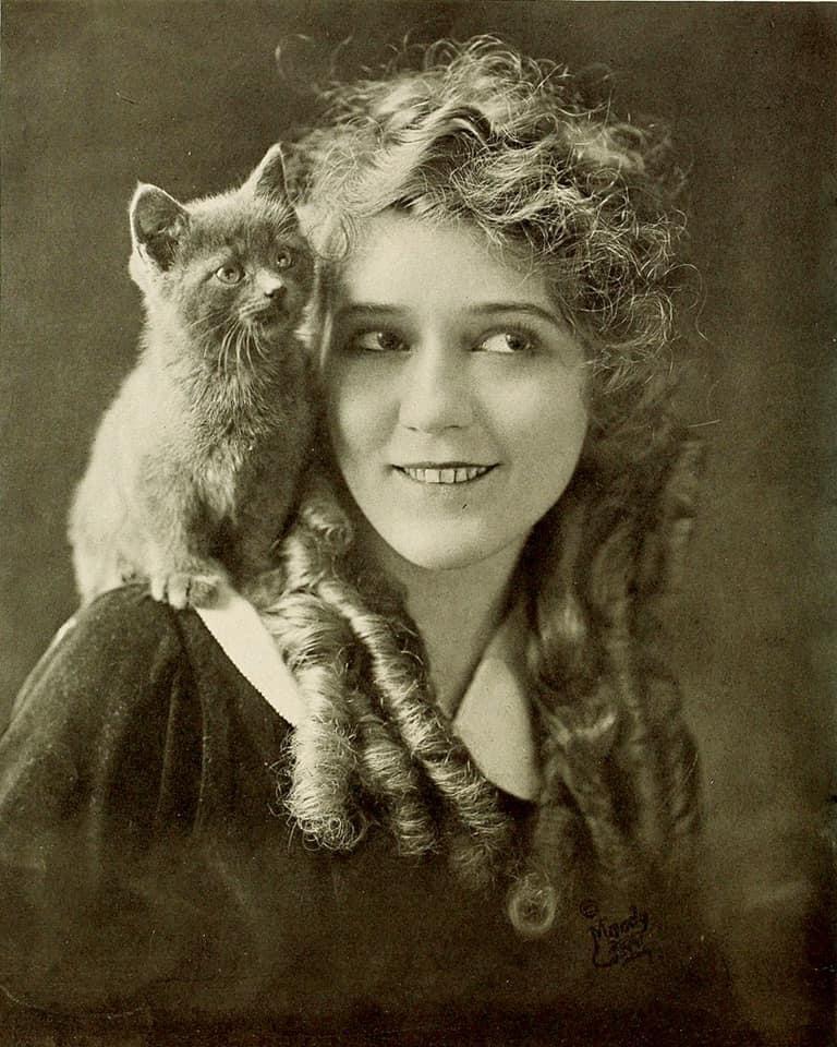 On June 24, 1916 Mary Pickford signed a one million dollar, two-year contract with Paramount.
“America’s Sweetheart” not only starred in the films, but the new contract gave her a percentage of movie revenue.

Image: Mary Pickford and a furry friend in 1916 via Wikimedia Commons
