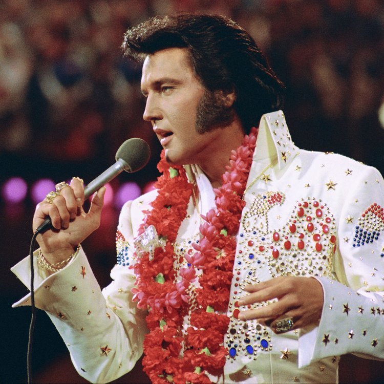 In 1973, Elvis achieved a historic feat as the 1st solo artist to broadcast a live concert worldwide through satellite with “Aloha from Hawaii via Satellite.” His performance at the Honolulu International Center was transmitted to over 40 countries and drew over 1 billion viewers