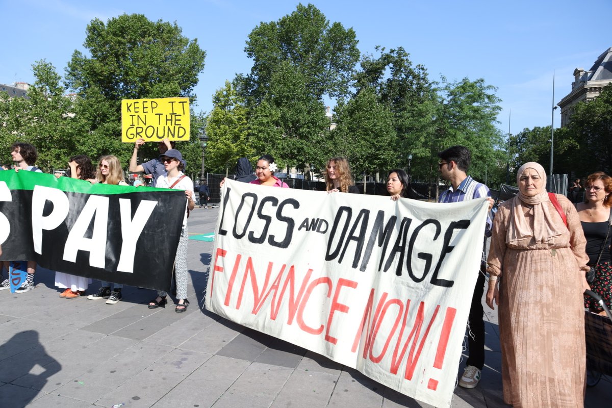 Protesters from around the world call for the end of #fossilfuel finance at the #ParisSummit. 
#GlobalFinancing