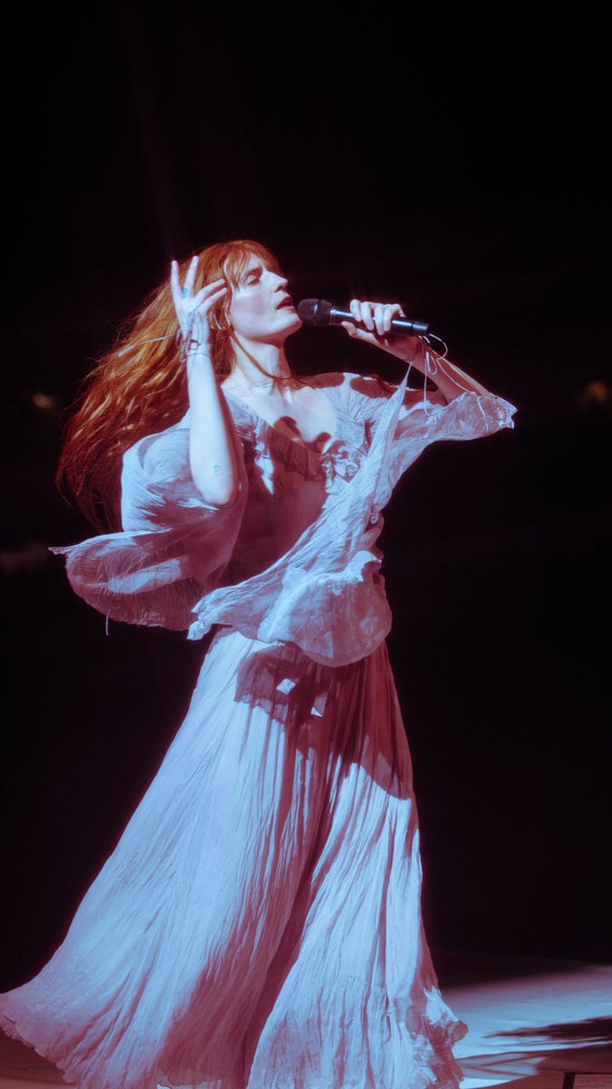 welcharchive's tweet photo. florence welch performing at the i-days milano coca-cola 2023 in italy. photographed by lillie eiger. https://t.co/M8z1pmFCzN