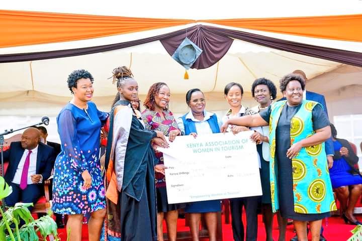 KAWTourism's tweet photo. Kenya Association of Women in Tourism team led by their Chairperson Ms. Jane Adam giving an award to the top female student in the diploma of Travel and Tourism course during #utalii47thgraduation award giving ceremony.
#utaliigraduation #tourismcareers https://t.co/gL05wbM6Y0