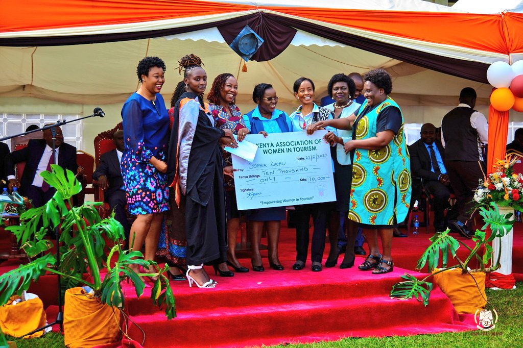 KAWTourism's tweet photo. Kenya Association of Women in Tourism team led by their Chairperson Ms. Jane Adam giving an award to the top female student in the diploma of Travel and Tourism course during #utalii47thgraduation award giving ceremony.
#utaliigraduation #tourismcareers https://t.co/gL05wbM6Y0