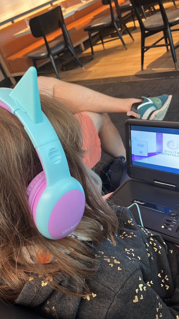 LMKAdams's tweet image. The only times she has stopped talking since waking up at 4:15 am is when she’s wearing headphones, so I made her pick a movie for our layover 😅 I haven’t had enough coffee for stream of consciousness questions.