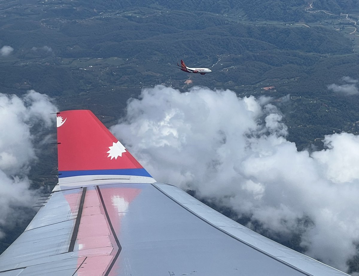 Close Encounter: Another commercial aircraft of #SpiceXpress seen from #NepalAirlines while waiting for flight landing permission in Kathmandu.