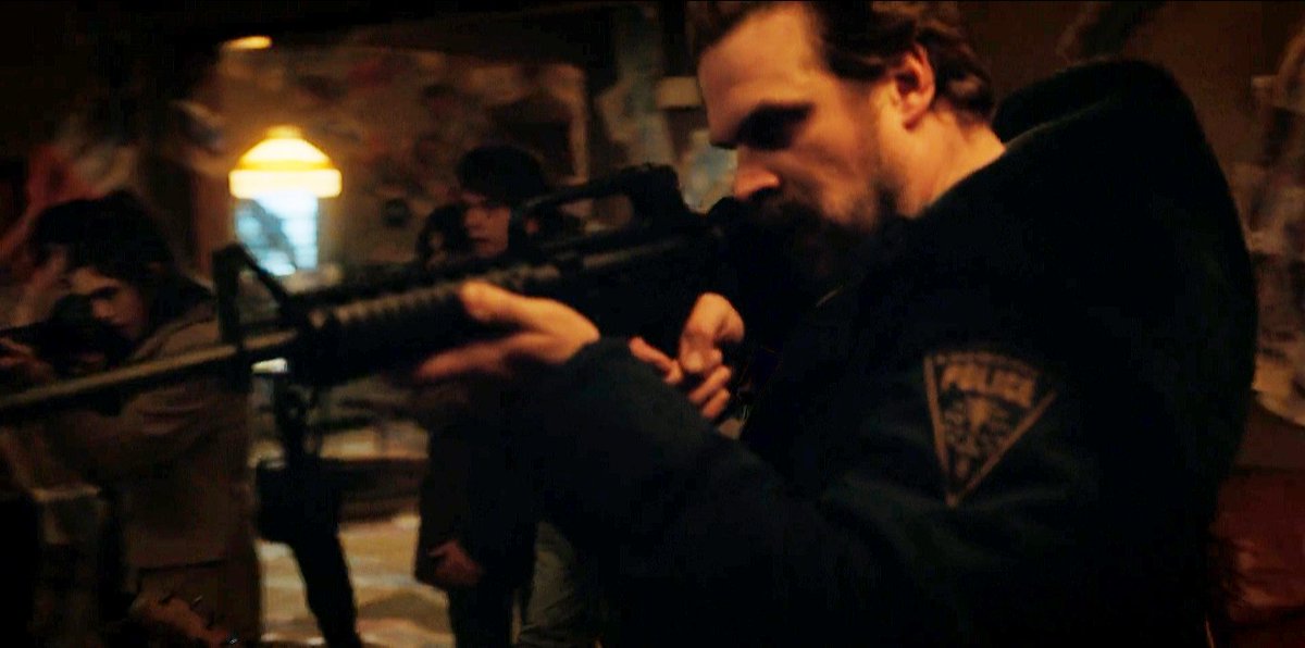 just something about chief jim hopper in his blue police coat