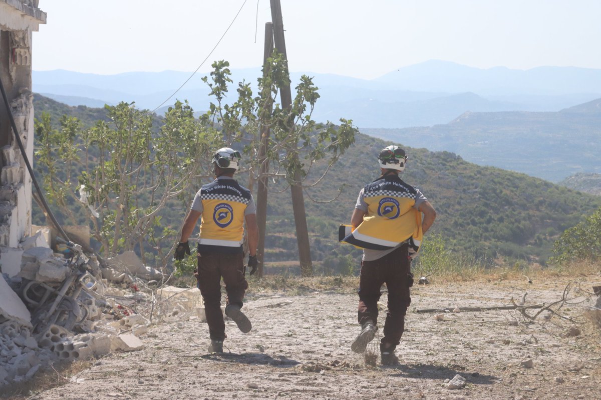 SyriaCivilDef's tweet photo. Two civilians (two young men, brothers), were killed by Russian air strikes, today, Saturday, June 24, targeting their farm, in the village of Basbat in the countryside of Jisr al-Shughur, west of #Idlib. The surrounding mountains in the village of Bikfla in the same countryside were subjected to an air strike. Our teams recovered the bodies of the two young men and put out the fires.
#Syria #Whitehelmets