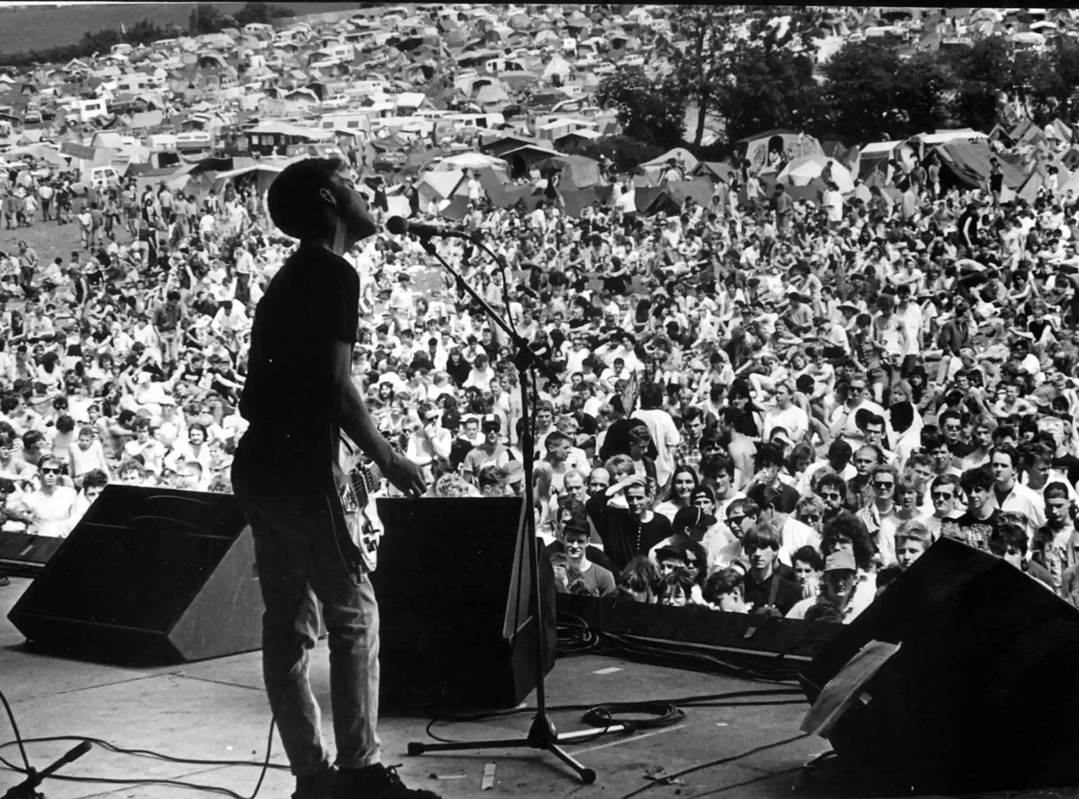 Bernard Sumner of New Order, Glastonbury Festival, 1981. Photo by Local World/Rex/Shutterstock.

 #BernardSumner #NewOrder #80s #80smusic #80srock #punk #newwave #postpunk #rock #rockmusic #music #alternativemusic #alternativerock #musicphoto #rockhistory #musichistory