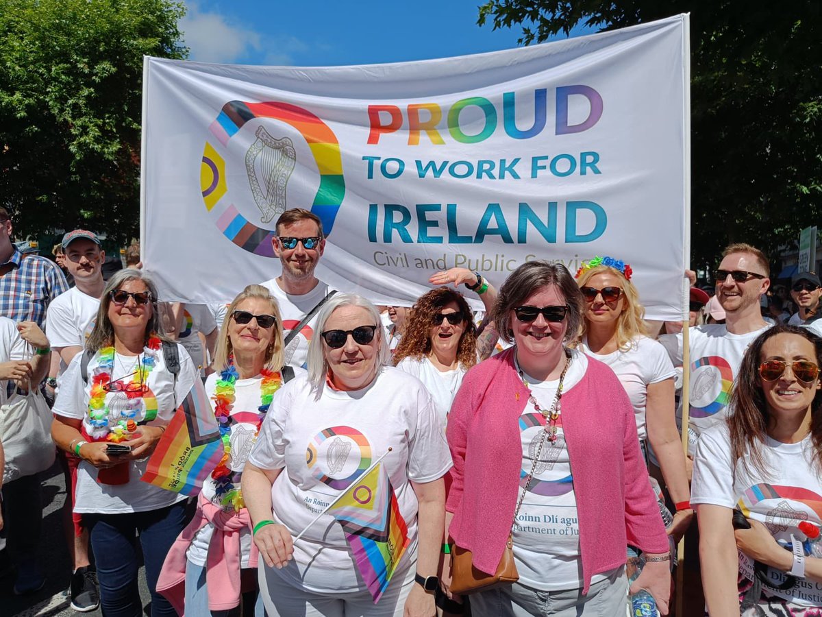 NeilPWard's tweet photo. So lovely (despite the extreme heat!) to march with these wonderful people and over 1100 other civil and public servants. Thanks to @DublinPride for having us. And to all in the @DeptJusticeIRL LGBT+ staff network for arranging #ProudToWorkForIreland https://t.co/7CmdTYrhih