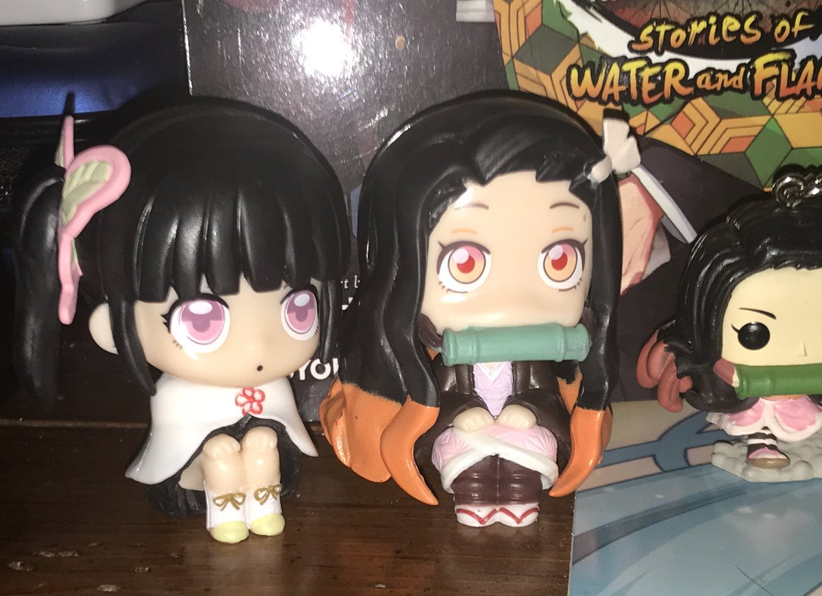 the lesbian collection has been furthered but idk why nezukos eyes look like that shes so dumb i love her😭😭😭😭😭