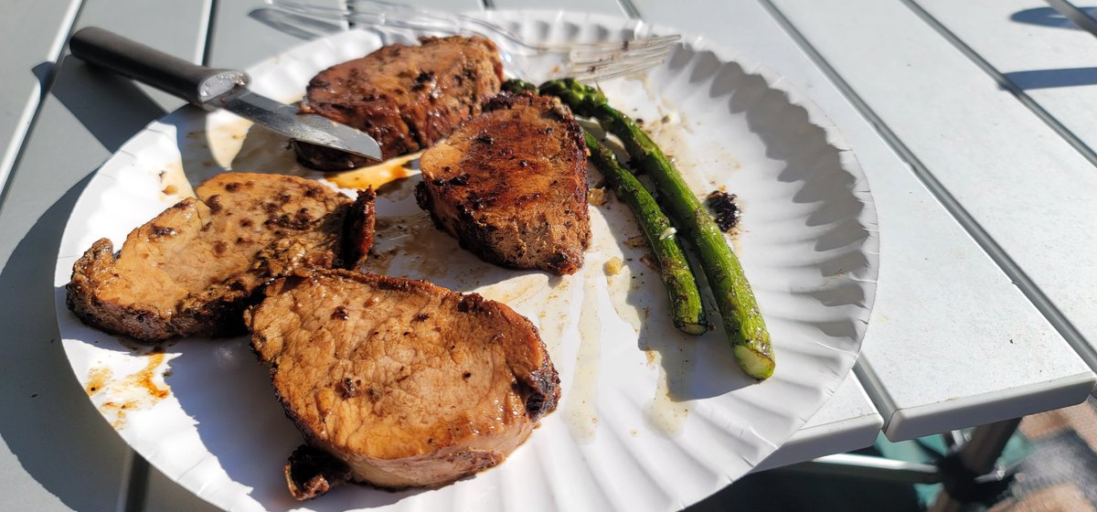 Faganator's tweet photo. If you are not making compound butter with diced garlic in a coffee cup to fry up your asparagus in, and roasting some delicious pork after the track is cold - I'm not sure we can be friends??  ; )  #HighTechRedneck #PaperPlateCulinary https://t.co/xD93SWlSUC