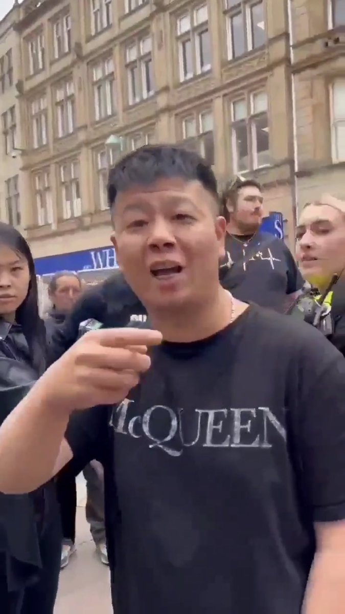 Byron_Wan's tweet photo. July 1, 🇬🇧 Sheffield: 3 arrogant 🇨🇳 little pinks clad in designer clothing harassed a peaceful march of HKers on the 26th anniversary of Hong Kong’s handover to China + 3rd anniversary of the enactment of national security law in the city. 

[video: organizer Re-Water’s FB page] https://t.co/RFcUpiD2y1