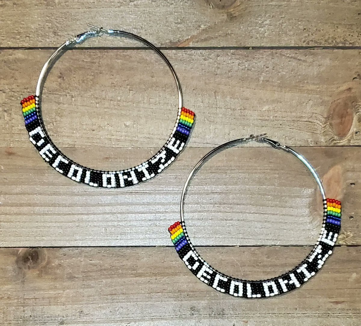 DECOLONIZE beaded hoop earrings, available @ a slightly lower in my Big Cartel store @ lovealaskadesign.bigcartel.com due to lower fees than Etsy . Qagaasakuq- thank you for looking!  #NativeTwitter #beadwork #AlaskaNative #FirstNations #NativeMade