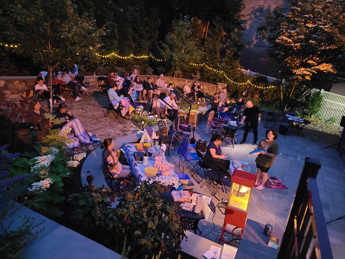 Were you at Outdoor Movie Night last Friday?  Did you have fun watching "Jaws" with us?  Are you going in the water anytime soon?

Next Outdoor Movie Night:  First Friday, July 7th!  Stay tuned to find out what we're watching!