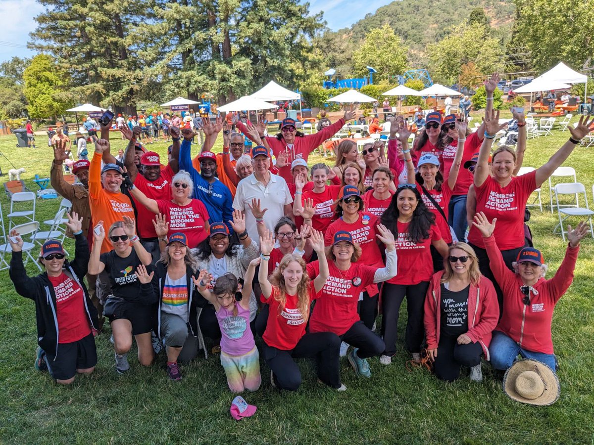 California @MomsDemand volunteers and survivors are out in force at @rocktheridegvp today! Thank you for your advocacy to help save lives and #endgunviolencetogether 🧡🧡🧡#honorwithaction