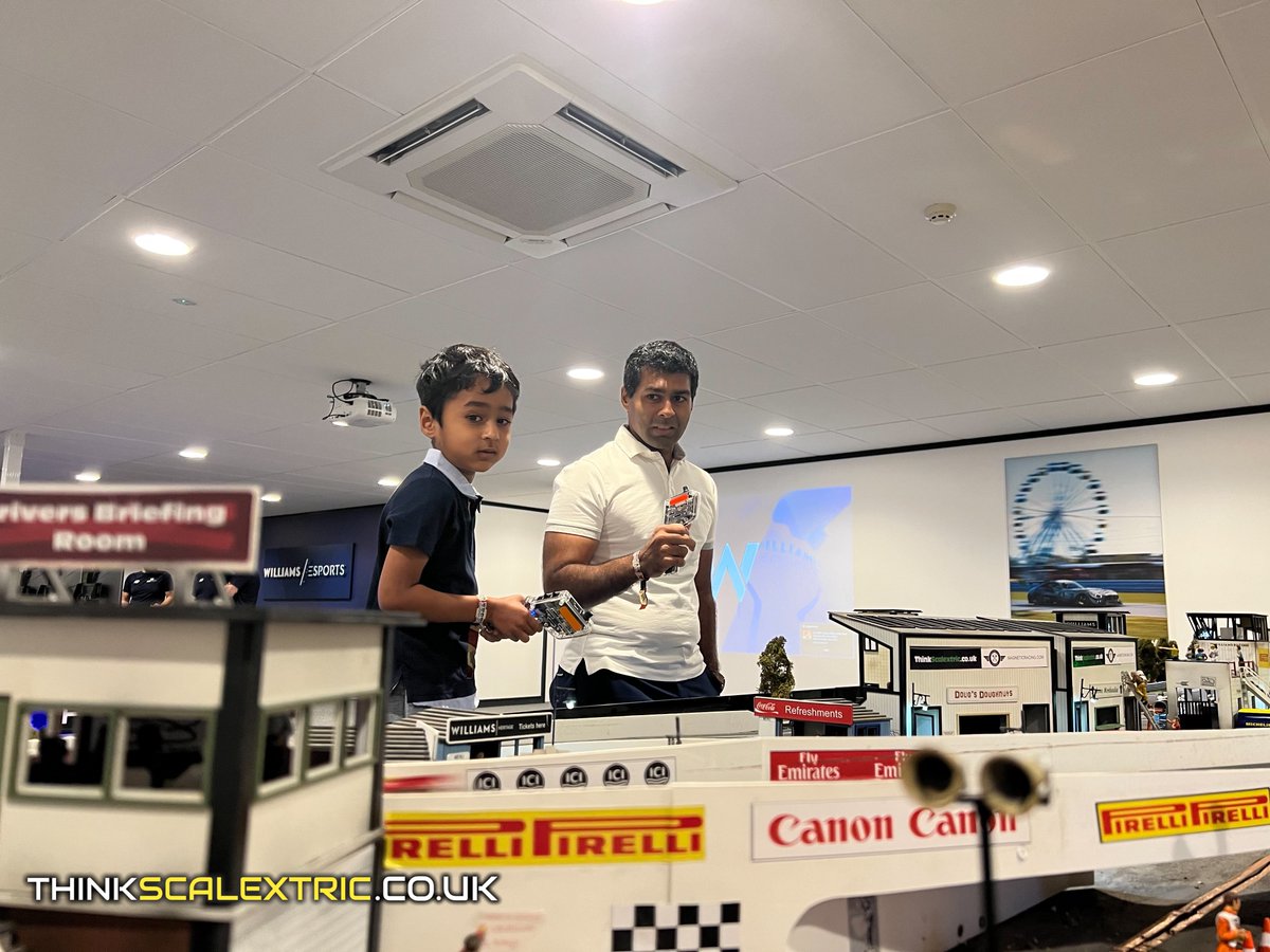 ThinkScalextric's tweet image. Was great to meet @karunchandhok again and have him race with his son on our giant @Scalextric track at @WilliamsRacing. Was also nice to meet his family. His son was top of the #FastestLap leaderboard for quite a while 🤜🏎️  #LikeFatherLikeSon