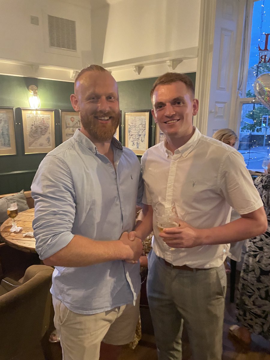 Two golf champions having a beer