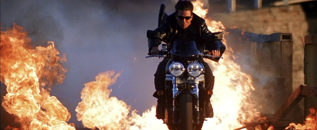 MISSION: IMPOSSIBLE II doesn't all work but man, it's so much fun. Just a wild fusion of East and West aesthetics, Hong Kong action meets Hitchcock and 2000s kitsch, metal riffs, suede jackets, lush hair flips and (so many) explosions. I love how so much of this looks and feels.