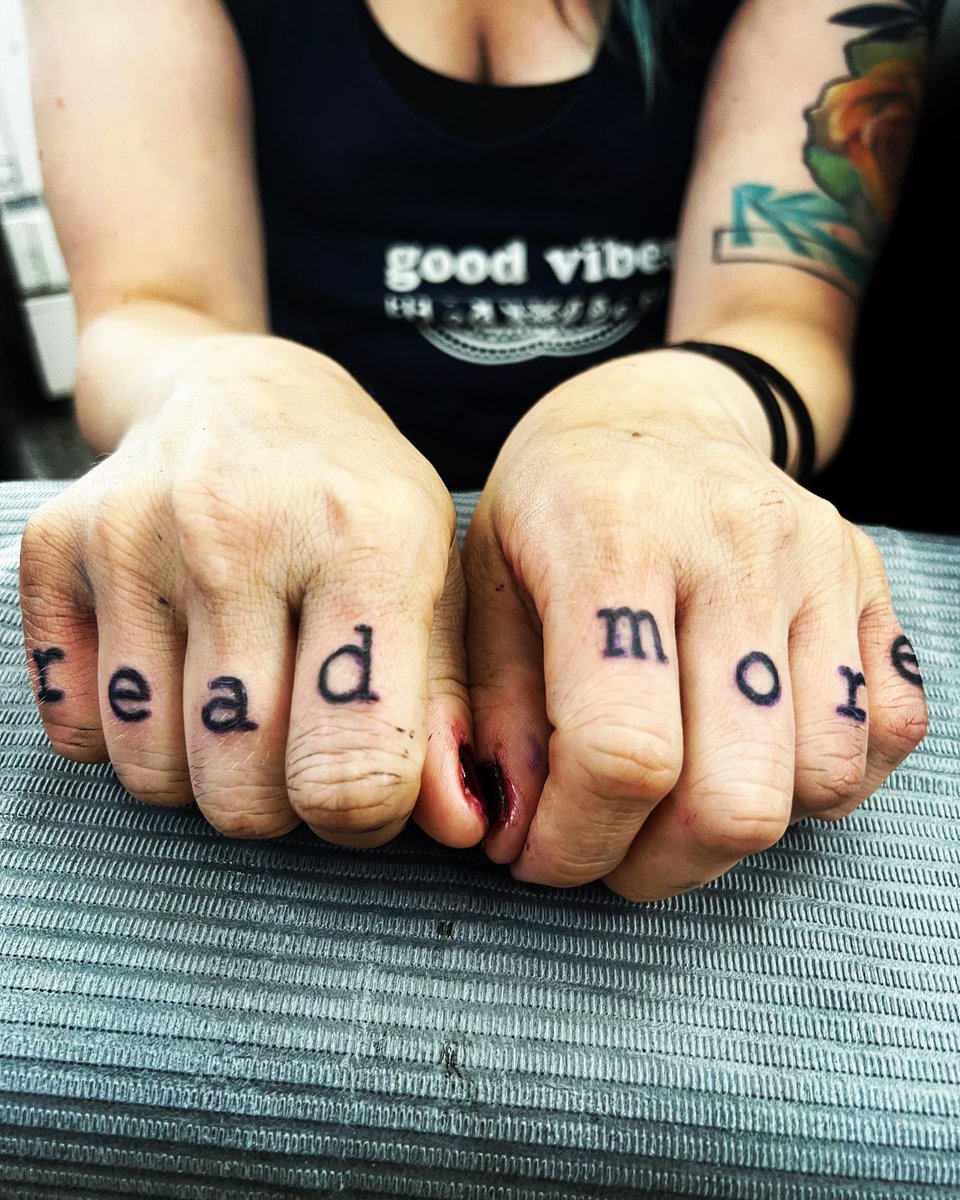 mrsdrianmalcolm's tweet photo. @noraflanagan Hey there, Knuckle Twin! 

I'm a server at Best Intentions and one of my customers today asked if I knew anyone else with 'read more' on their knuckles as his former HS teacher has it, too. Out of curiosity, I asked for the name of said teacher (and he said YOU)! https://t.co/DRSjhvQYRV