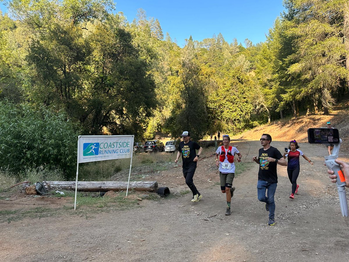 Courtney Dauwalter continues to lead #WS100 at mile 85 in 13:08 elapsed. That's a full hour and 4 minutes under the course record. Courtney is all smiles, waving to the aid station volunteers. She breezed through with a skip in her step!