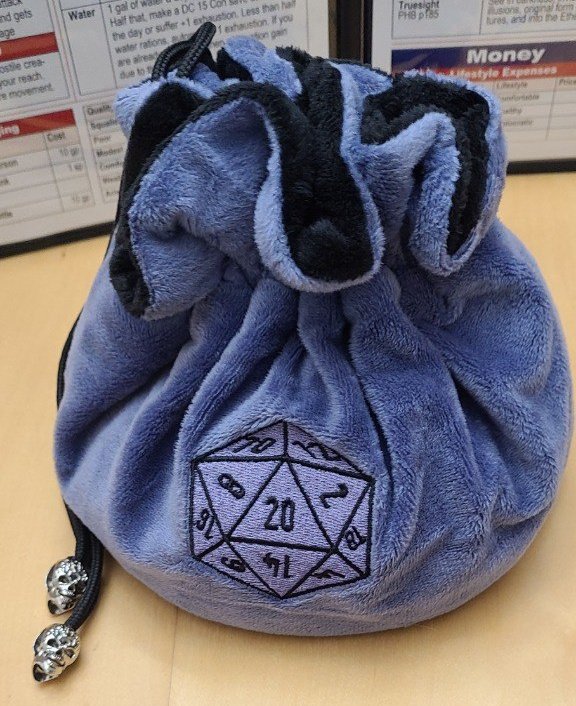 ZachsBigWave's tweet photo. My wife is the best! My birthday presents were all for enhancing my swag at the D&amp;D tabke. @Janinakins got me a new dice bag, a modular DM screen, and my first set of metal dice! https://t.co/VWXBHM2g6q