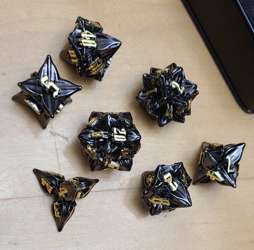 My wife is the best! My birthday presents were all for enhancing my swag at the D&amp;D tabke. <a href="/Janinakins/">🐍Nina🐍</a> got me a new dice bag, a modular DM screen, and my first set of metal dice!